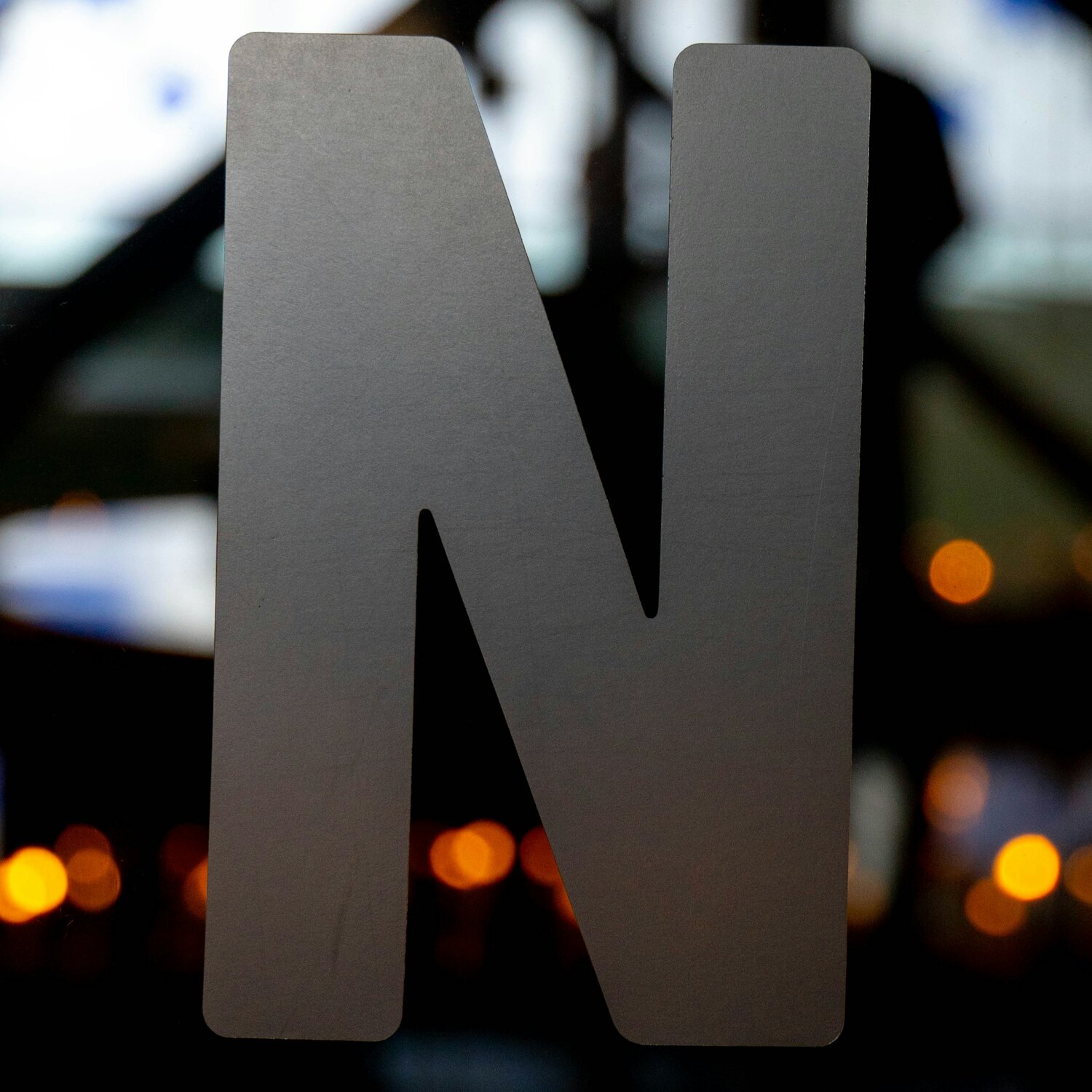 gray letter N