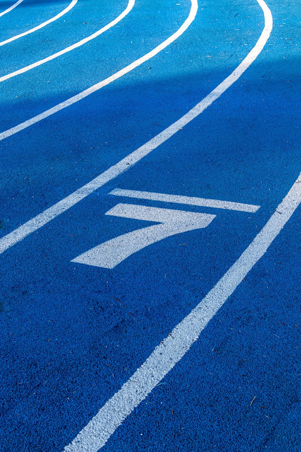 number seven on a blue race track