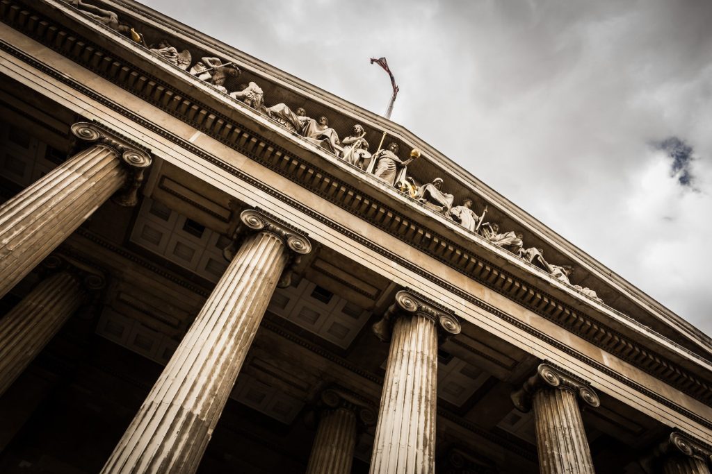 courthouse with pillars and sky