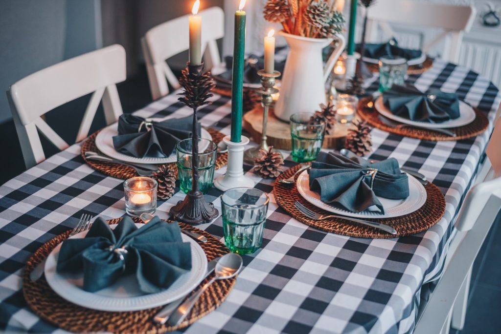 blue and white checkered table cloth with christmas dinner