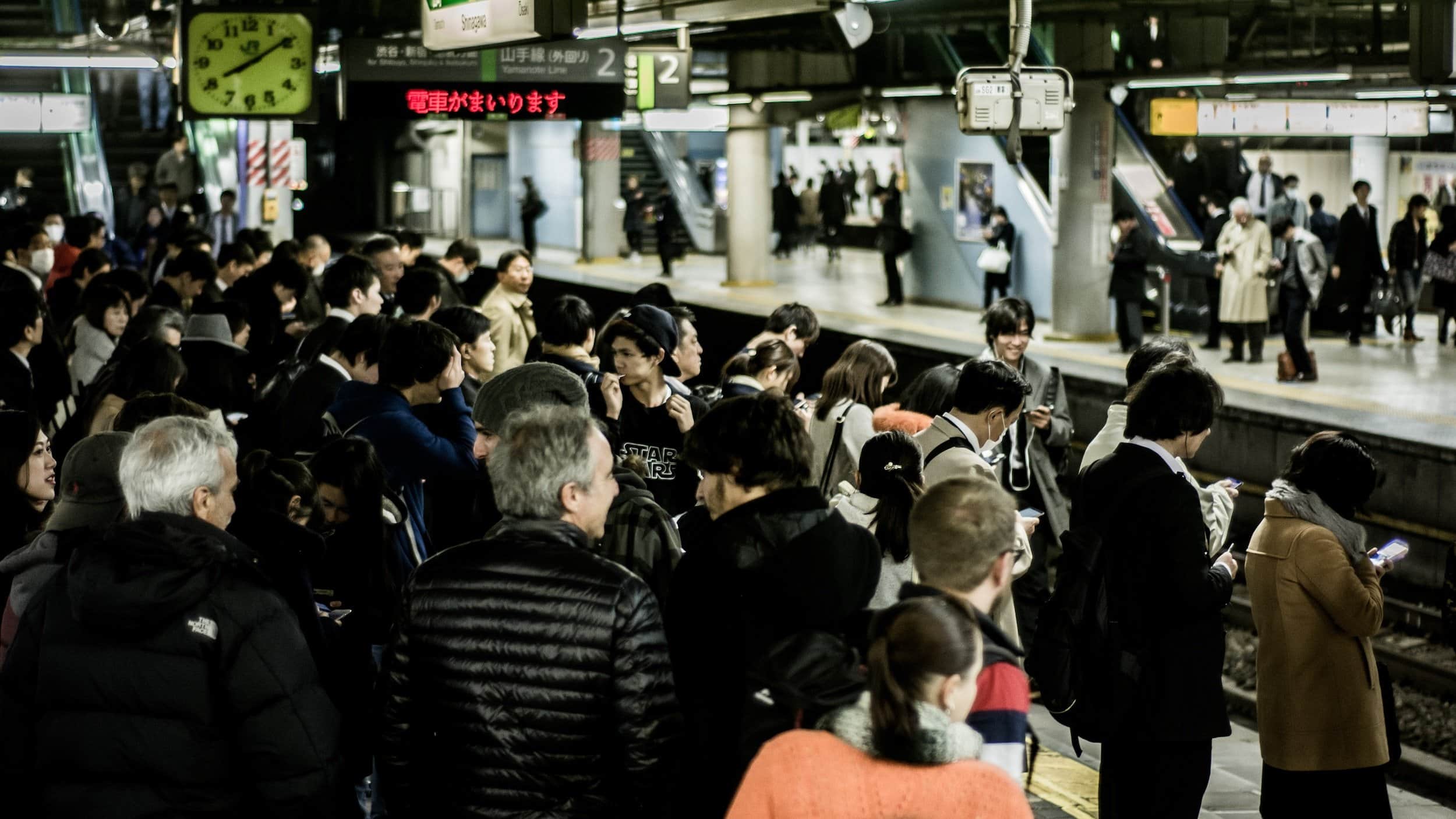 crowd of people on subway platform