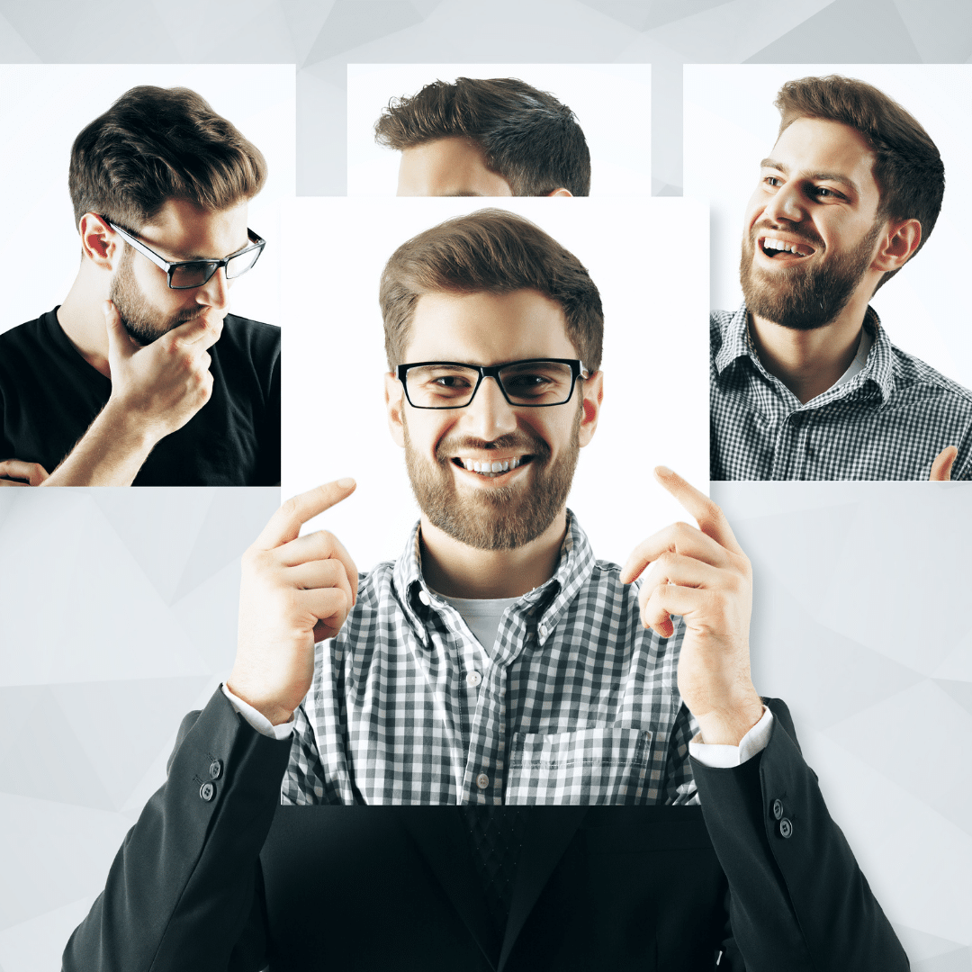 man holding picture of a man's face in his hands